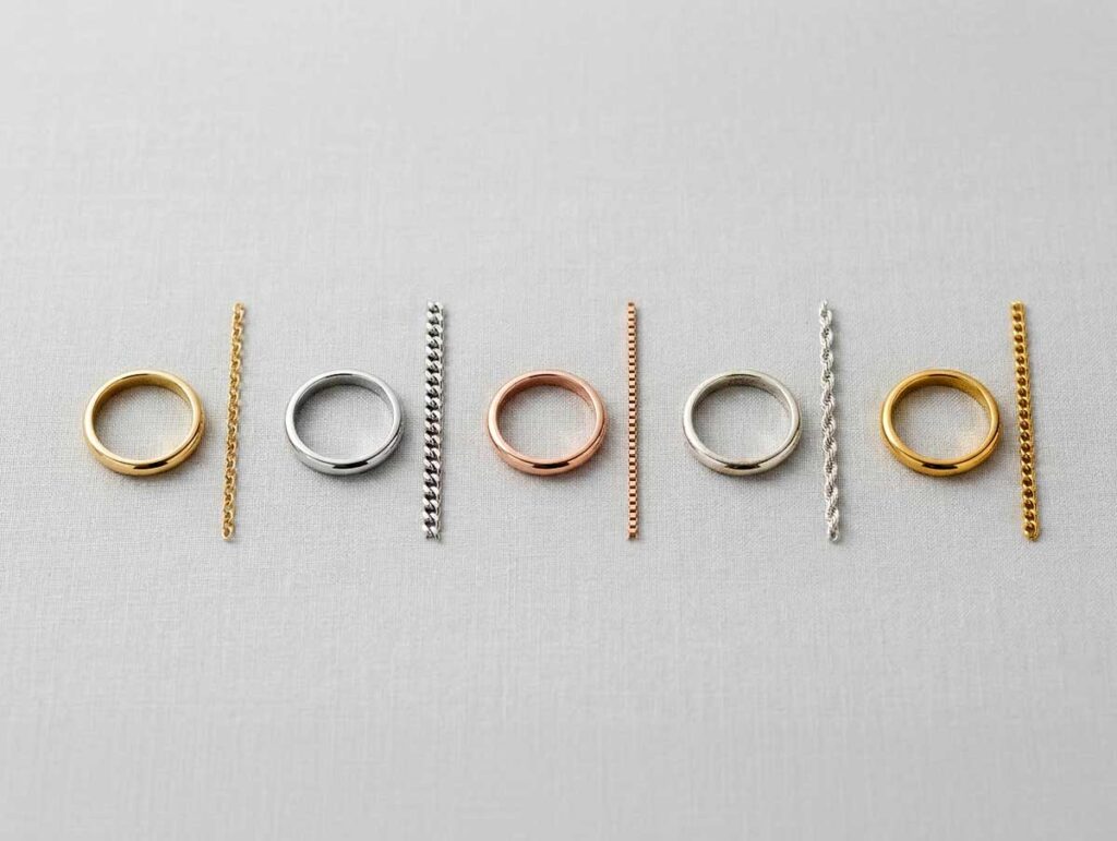 Comparison of yellow gold, white gold, rose gold, sterling silver, and plated jewelry tones displayed side by side