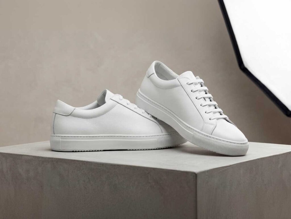 Minimalist fashion sneakers with a rubber sole and lace-up design